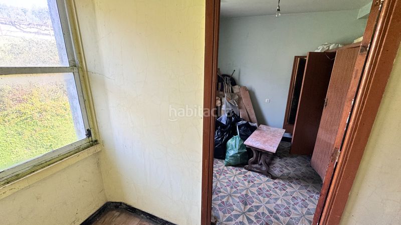 Foto db69f18a-c240-40ce-b91b-4cab3a5c5308. Casa amb aparcament a Oseiro Arteixo