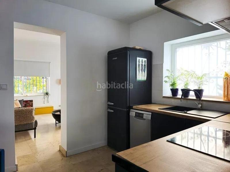 Foto c3d938f6-8543-4065-b4ef-f11f80064918. Chalet avec parking dans El Bajondillo Torremolinos