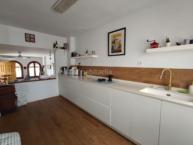 Foto 54ca42e9-8440-42e9-a826-610b8b98e82b. Casa aparellada amb calefacció aparcament a La Colina Torremolinos