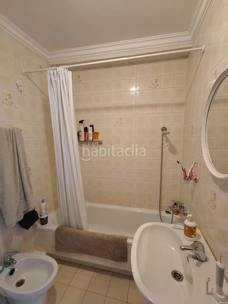Foto aa49be53-9745-4514-8b12-9a174b64bc66. Casa aparellada amb calefacció aparcament a La Colina Torremolinos