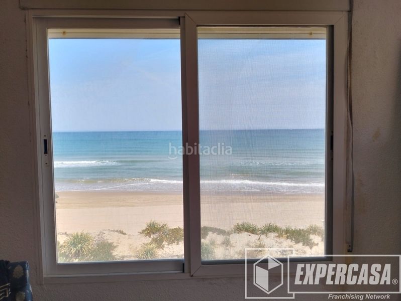 Foto 550ed440-3b22-48bf-99f3-09ce09a332a4. Chalet en El Perelló Sueca