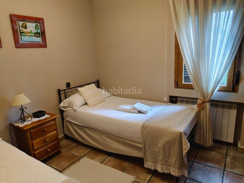Foto cf52bdb9-a647-489d-85e7-5c8a311ebfa2. Xalet amb calefacció aparcament piscina a Bustarviejo