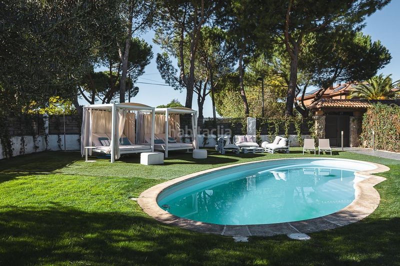 Foto 0e0dcf82-610f-4774-9af7-c9e1047c7741. Casa aparellada amb calefacció aparcament piscina a Boadilla del Monte