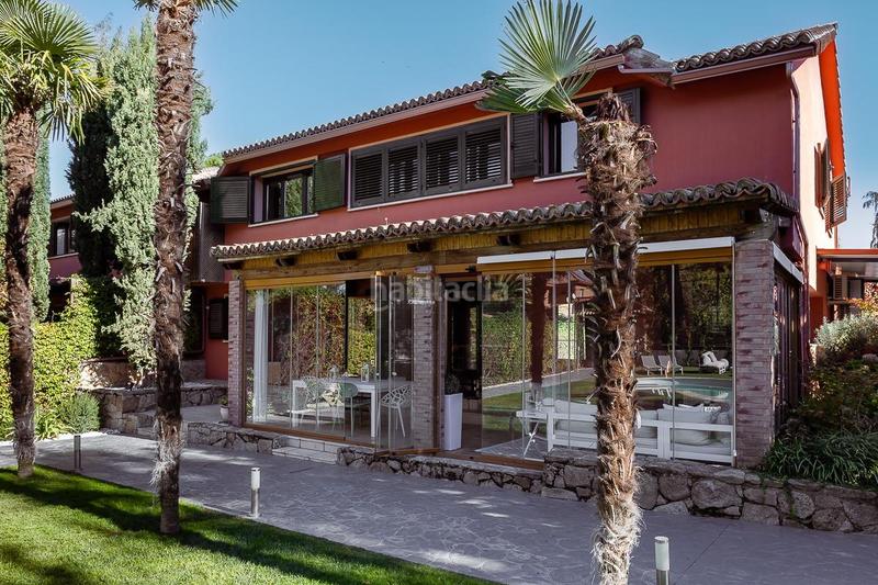 Foto 6090cc04-dd10-43ef-a844-a98061ca0eb2. Casa aparellada amb aparcament piscina a Bonanza Boadilla del Monte