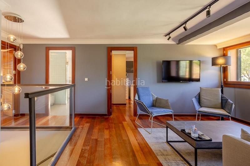 Foto 8bd3b25d-d129-4ecc-a6ce-058057404bb7. Casa aparellada amb aparcament piscina a Bonanza Boadilla del Monte