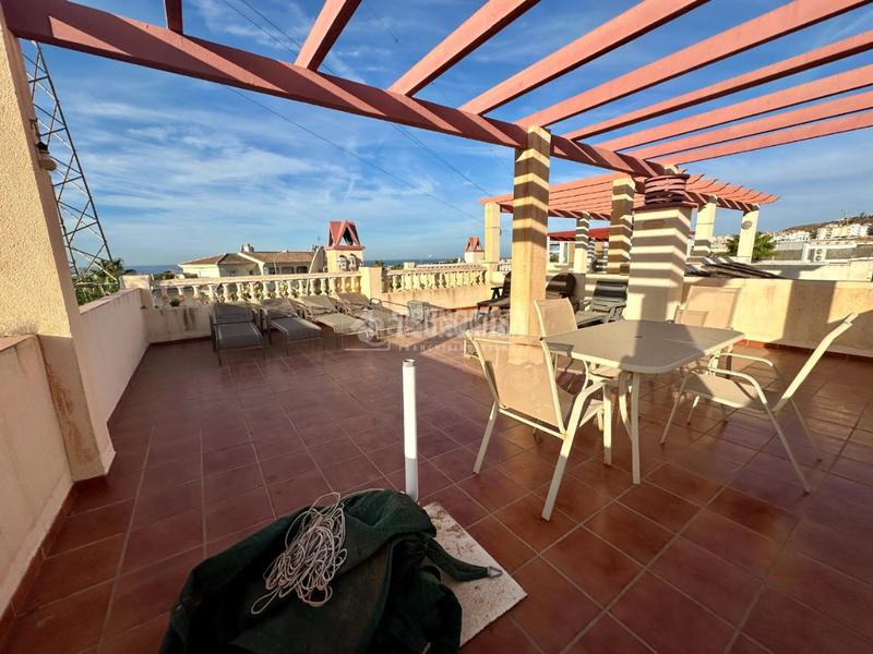 Foto 4ad5d714-fe70-4079-a921-a8c0edc5bf40. Maison jumelée avec piscine dans Torrox park Torrox