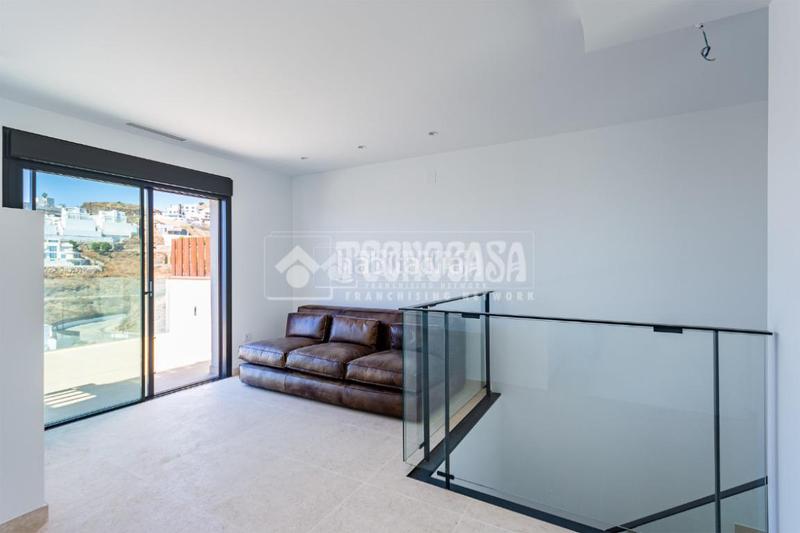 Foto 025aa610-83c1-4fc4-9d7c-744145df9227. Doppelhaus mit parking pool in El Peñoncillo Torrox