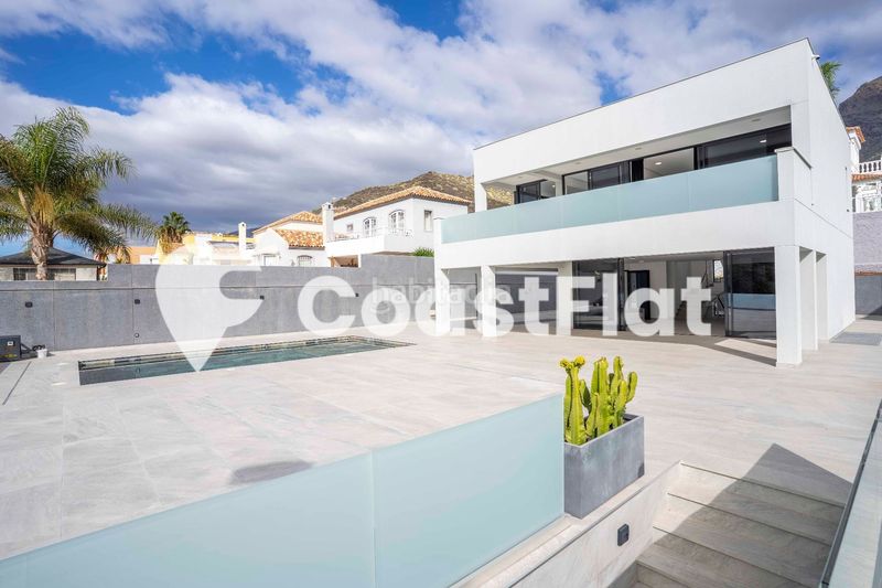 Foto 1a838ed8-5b9b-40bf-bde5-e9ddd8a4c185. Chalet moderna villa a estrenar!! en la prestigiosa zona de costa !! en Adeje