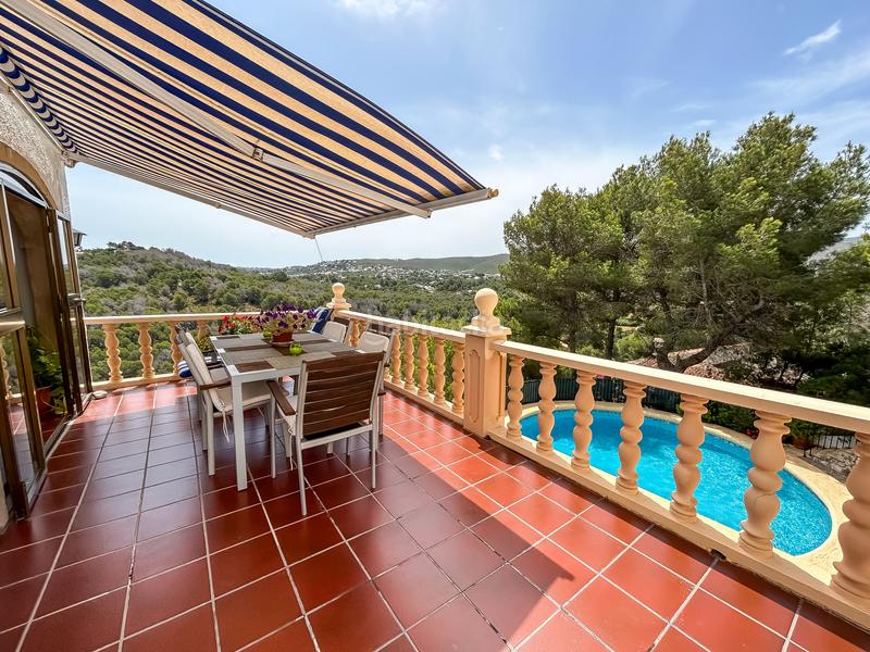 Foto 1207f384-83a1-4ab7-ab28-41ce9ffd9d9a. Casa impresionante villa con vistas al mar inmaculadas en el centro de jávea en Xàbia