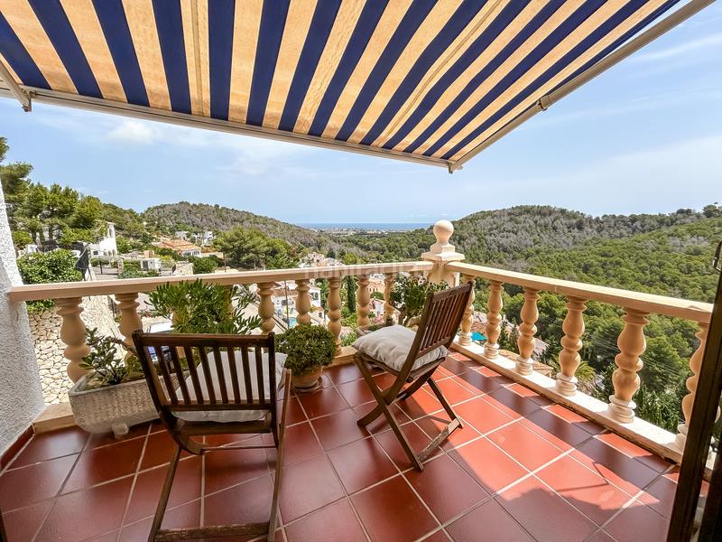 Foto bad26e25-c9ed-4bfb-8112-dda7e262bb27. Casa impresionante villa con vistas al mar inmaculadas en el centro de jávea en Xàbia
