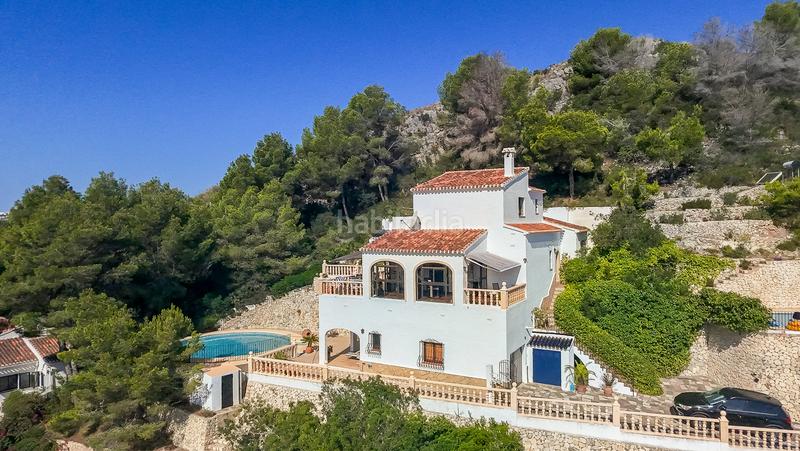 Foto c0e4c4ad-bf61-4d4e-acc9-3e6d34c2502f. Casa impresionante villa con vistas al mar inmaculadas en el centro de jávea en Xàbia