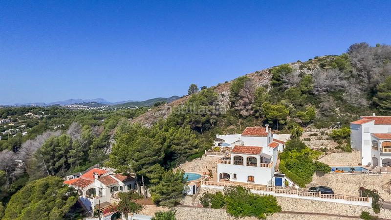 Foto f7a50585-0cfe-44db-a3f8-3b304228a9b5. Casa impresionante villa con vistas al mar inmaculadas en el centro de jávea en Xàbia