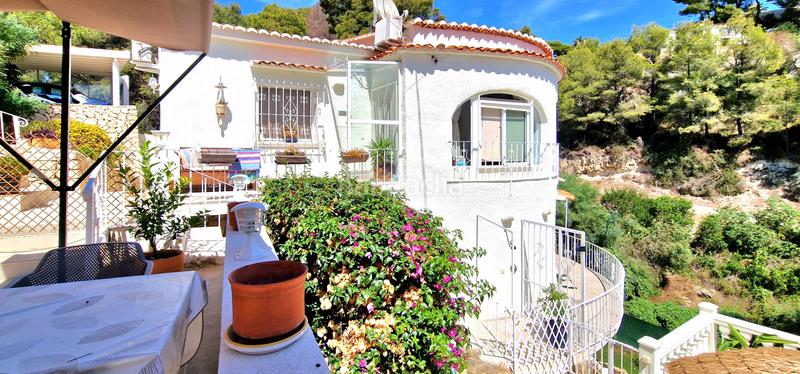 Foto 1b6a2856-f473-47aa-ae16-f9d51a8a77e6. Casa encantadora villa renovada en una zona verde cerca de la playa de baladrar en Benissa