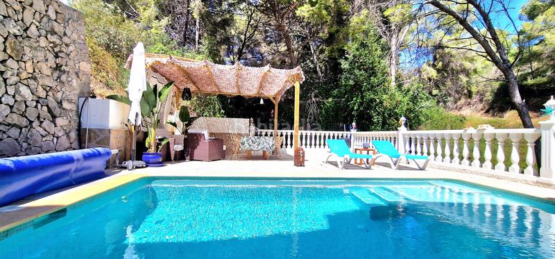 Foto 856ff67d-b6cc-4c8e-91d6-34fc0fa8ebdb. Casa encantadora villa renovada en una zona verde cerca de la playa de baladrar en Benissa
