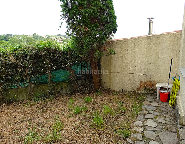 Foto 56b0bced-f3a0-4873-a8d1-c659f3742e01. Casa adossada amb xemeneia aparcament a Miño