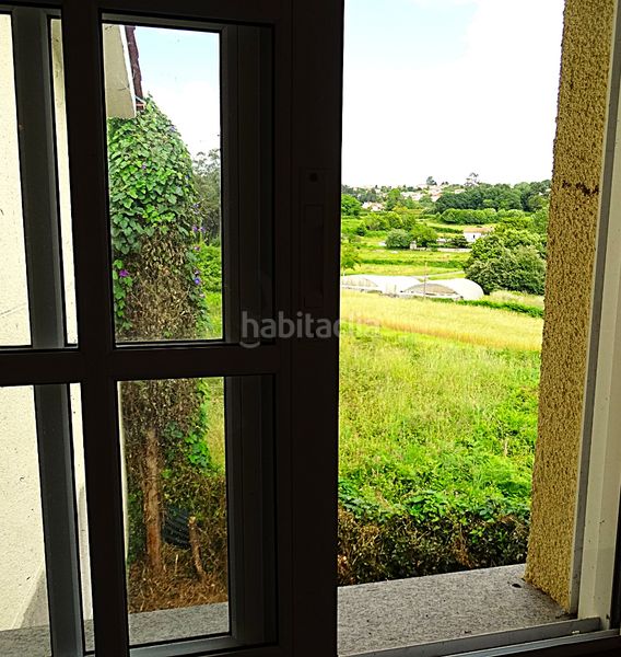 Foto ddc4c0dd-b541-495d-a395-46d897822feb. Casa adossada amb xemeneia aparcament a Miño