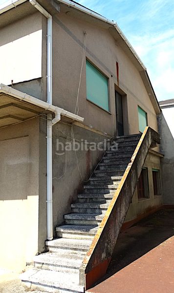 Foto 788ee8a7-bc92-4f5f-9fac-6f431e4ca6a2. Casa a rúa feira nova 14 a Valadouro (O)