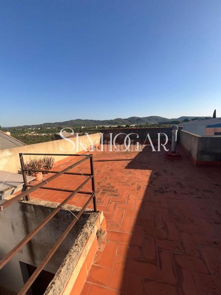 Foto 4d1ef1c9-46c4-41d9-8b3f-b7529e90590e. Casa adossada a Alcàntera de Xúquer