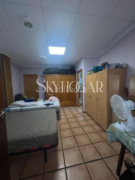 Foto b54b0d97-f769-48f3-bf32-f8fc29f97dac. Casa adossada a Alcàntera de Xúquer