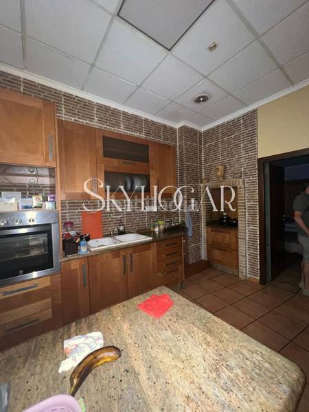 Foto f4667419-08a1-4b91-9fcb-96fd0e8a1f9d. Casa adossada a Alcàntera de Xúquer