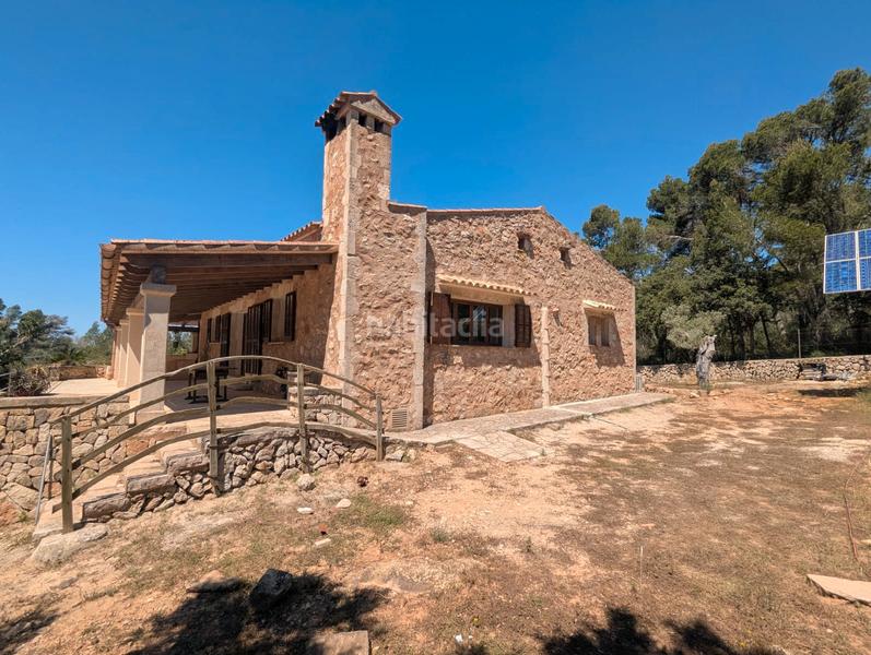 Foto b474b82f-d2f4-489f-954d-2148bc2232e1. Location mas avec cheminée dans S´Horta - Cas Concos des Cavaller - Es Carritxó Felanitx