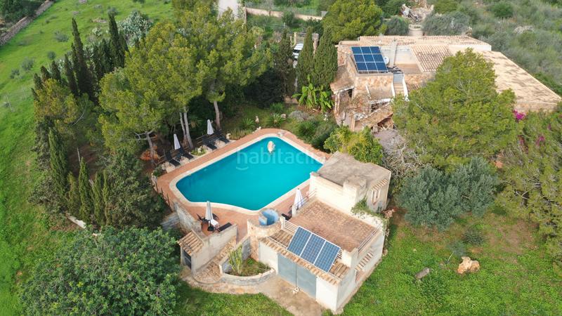 Foto 08234ffb-c548-42b3-be23-5dbc07b1d601. Masia amb xemeneia piscina a S´Horta - Cas Concos des Cavaller - Es Carritxó Felanitx