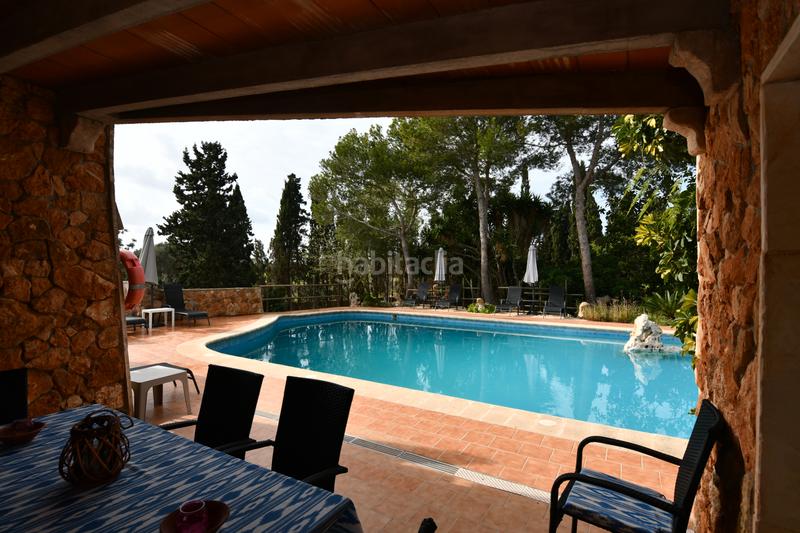 Foto 396ca021-ea7b-4e3a-b70e-eb367d9653e0. Masia amb xemeneia piscina a S´Horta - Cas Concos des Cavaller - Es Carritxó Felanitx
