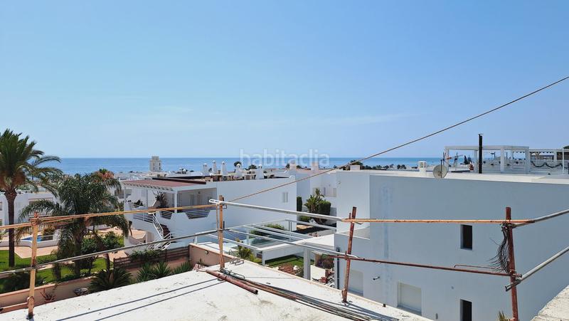 Foto e2f796ca-5d3d-42f1-9d80-5d895f614a59. Chalet  en venta playa, 3 dormitorios. en El Palmeral Mojácar