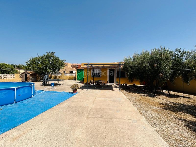 Foto 9a835b16-2d08-433d-9bb2-d776bc2e9615. Chalet  independiente con casa de invitados, piscina privada y parcela urbana de 3.010 m2 en la Cañada del Fenollar en Alicante