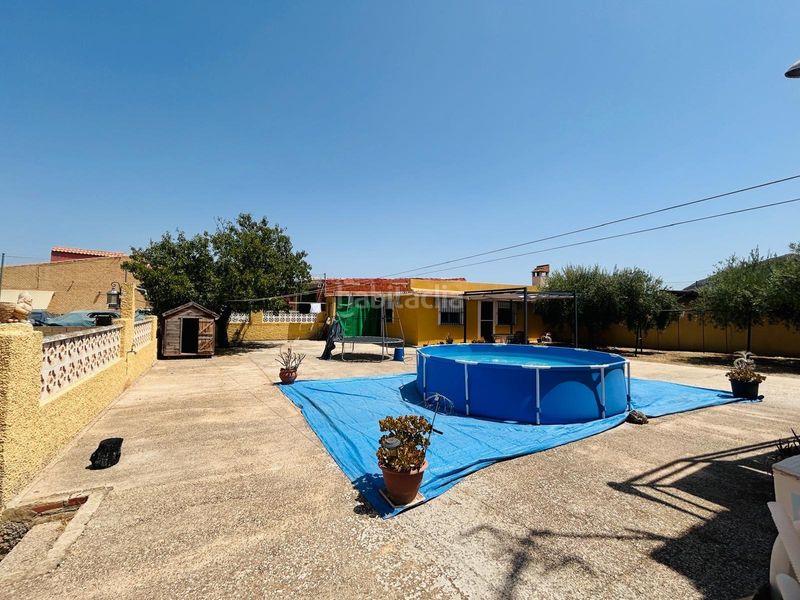 Foto c51eb86e-436d-4541-9694-227ee5f891a7. Chalet  independiente con casa de invitados, piscina privada y parcela urbana de 3.010 m2 en la Cañada del Fenollar en Alicante
