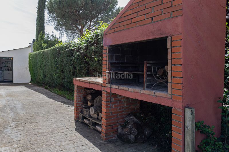Foto b95f0858-dd31-4835-865c-86f83a4a66ee. Xalet amb xemeneia calefacció aparcament piscina a Soto del Real
