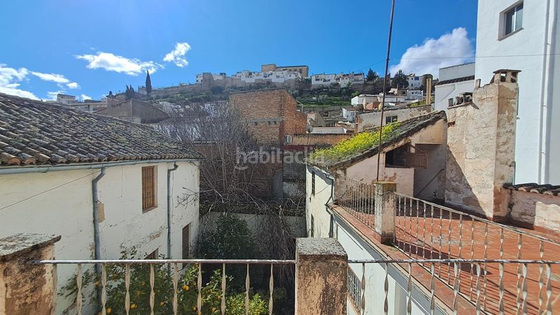 Foto 4940bb6e-7b3a-4bc6-bcdc-4cce225b9a28. Casa adossada amb aparcament a Loja