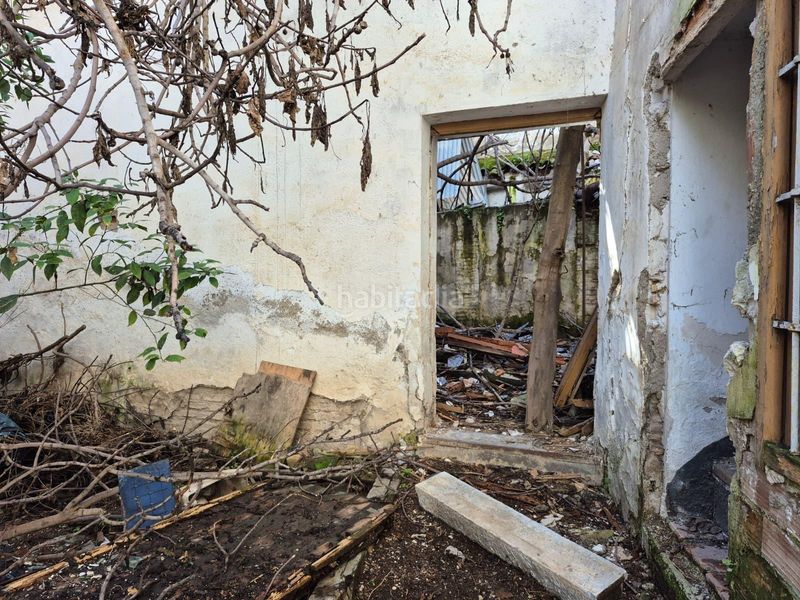 Foto a348bdd2-00ff-4b5f-8b78-82184ec46a6e. Casa adossada amb aparcament a Loja