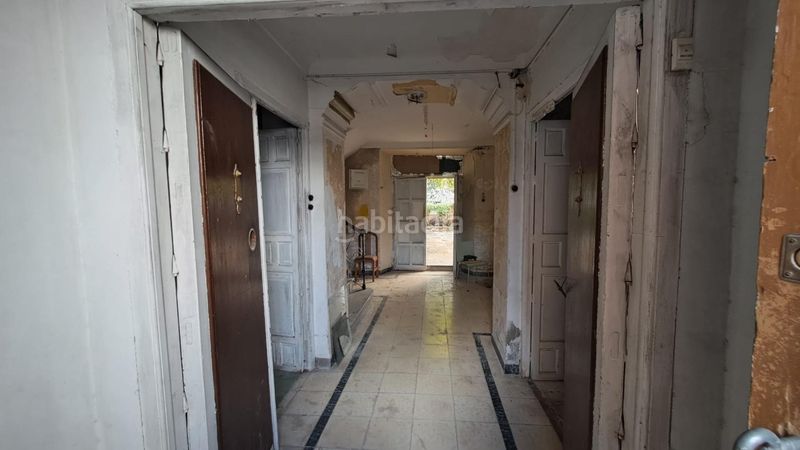 Foto ca29db8e-0841-4174-811d-48a2fa5018a6. Casa adossada amb aparcament a Loja