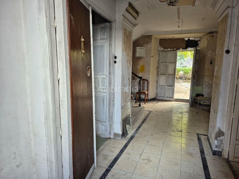 Foto f6b44191-88be-46f4-ae74-989af287238c. Casa adossada amb aparcament a Loja