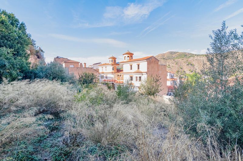 Foto ec7e37bf-11ee-4dd9-b825-560faf211825. Terreny residencial a calle calle parradas a Vélez de Benaudalla