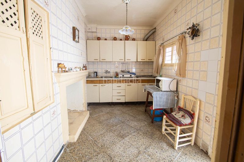 Foto a1eb32ef-c2e0-49c2-a3ab-ec5cd2e1efd5. Casa adossada a Íllora