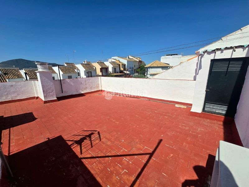 Foto 06b7b1b1-4418-401e-9e02-cd9d48bd8879. Casa aparellada amb aparcament a Morón de la Frontera
