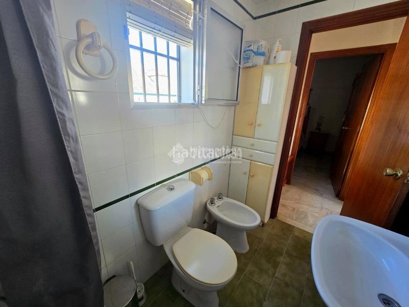 Foto 5f318d80-e025-474e-9c10-01894e08c52c. Casa aparellada amb aparcament a Morón de la Frontera