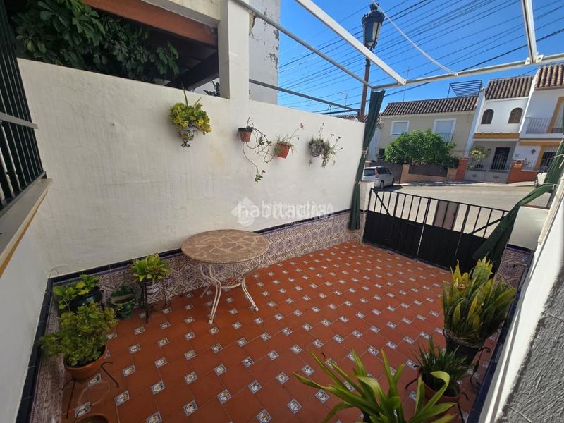Foto 601c1b72-2854-4e30-a7ef-67db3becd1da. Casa aparellada amb aparcament a Morón de la Frontera