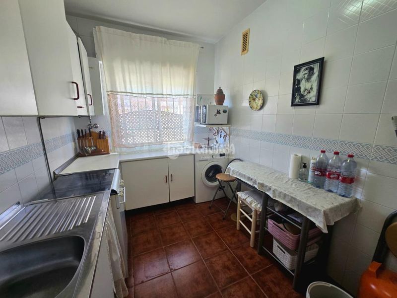 Foto e888230b-bbd6-48bf-8052-ac00f3e26907. Casa aparellada amb aparcament a Morón de la Frontera
