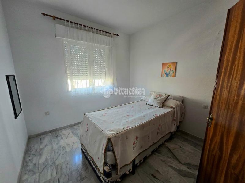 Foto f452497d-27e9-4d5e-99fa-3b00a61c27c1. Casa aparellada a Morón de la Frontera