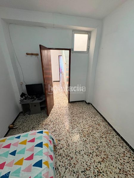 Foto 5044e703-2261-4994-87d6-c8972cf83454. Casa aparellada a Morón de la Frontera