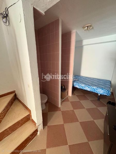 Foto c003e1f3-2de9-4af8-8bcd-b640596a7cdb. Casa aparellada a Morón de la Frontera