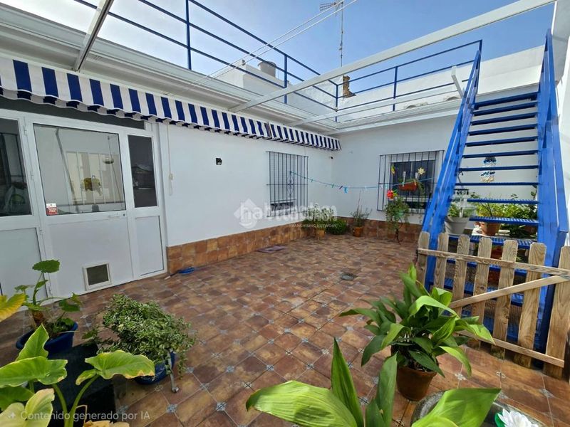 Foto 0e35f5d5-5bc0-47f0-9707-8c14cc376386. Casa aparellada a Montellano