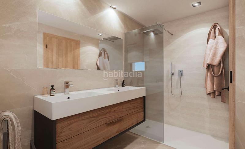 Foto f5644bea-9fea-402b-8b3c-65e86c321571. Casa adossada amb calefacció aparcament piscina a Mijas