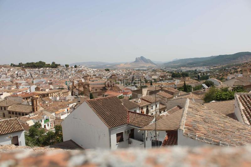 Foto 12e33e40-59ca-4523-bfa0-67eed1023d7d. Casa aparellada amb calefacció aparcament a Casco Histórico Antequera