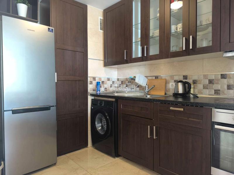 Foto 5a8b3a03-1253-4329-a42c-6d0044d47ca0. Lloguer apartament amb calefacció aparcament piscina a Benalmádena