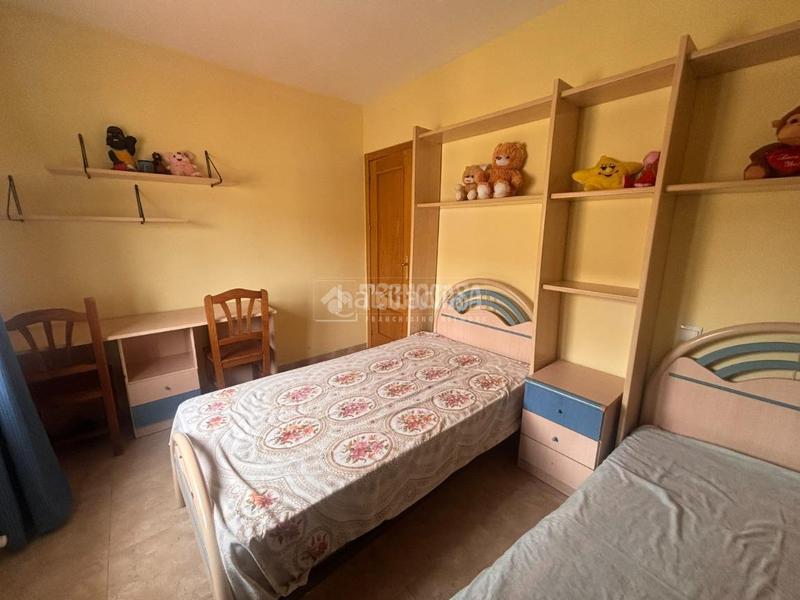 Foto c23a286c-6068-456d-ac0a-9cd2b8a57679. Casa aparellada a Tomelloso
