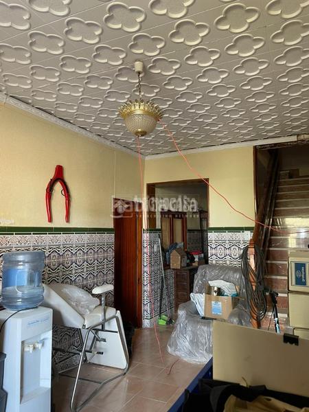 Foto 74e45856-6cb7-44f3-bcd2-ab683eba8859. Casa aparellada a Tomelloso